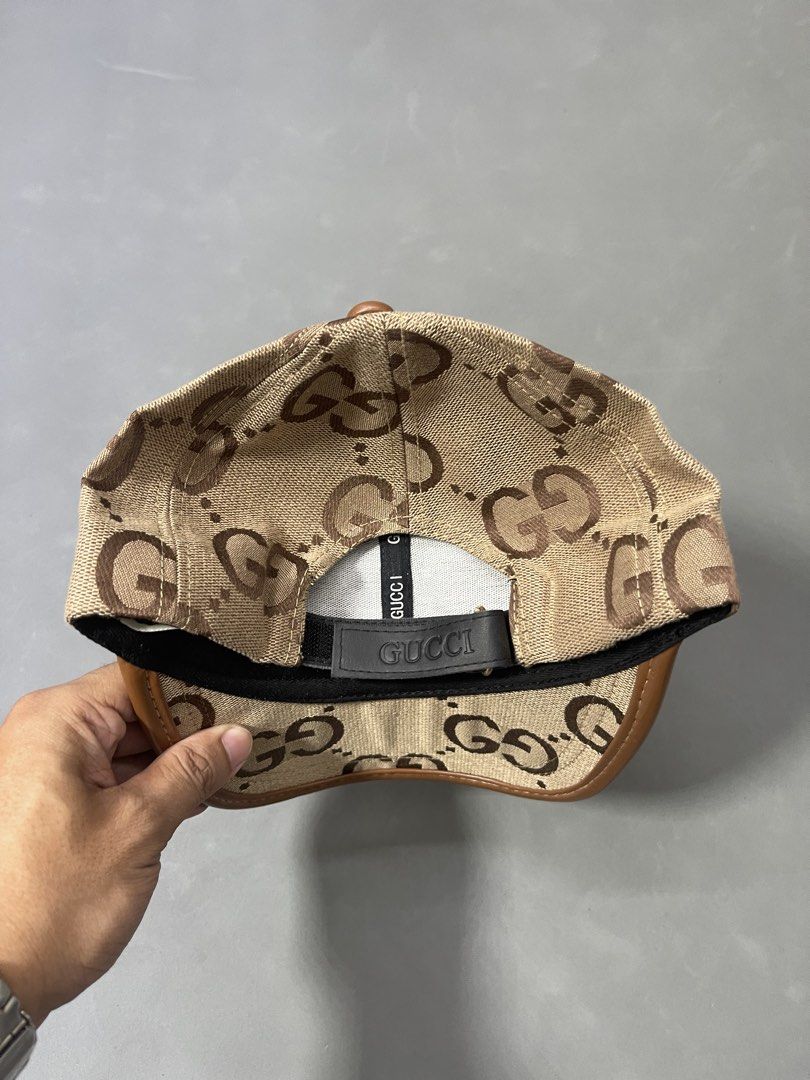 Gucci GG Canvas Baseball Cap Brown Beige (Category: Caps & Hats) located in Manila. Submitted by mine2ownit (Listing ID 1467287517, Image 3). Description: - Gucci baseball cap in classic brown and beige GG monogram canvas - Premium brown leather trim along the brim edge - Adjustable back strap with Gucci branding for a custom fit - Clean interior with branded lining ribbons and tags.