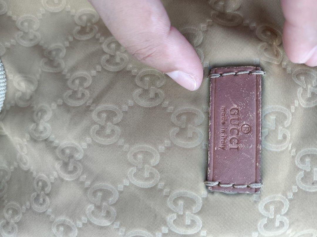 Gucci GG Nylon Half Moon (Category: Cross-body Bags) located in Bolinao. Submitted by shayne_0215 (Listing ID 1467340075, Image 2). Description: - Ukay Source - Has obvious signs of use - Coded - As Is Where Is - Last Price Posted - Deal Now, Pay Now - MOP: GCASH - SF will be shouldered by the buyer.