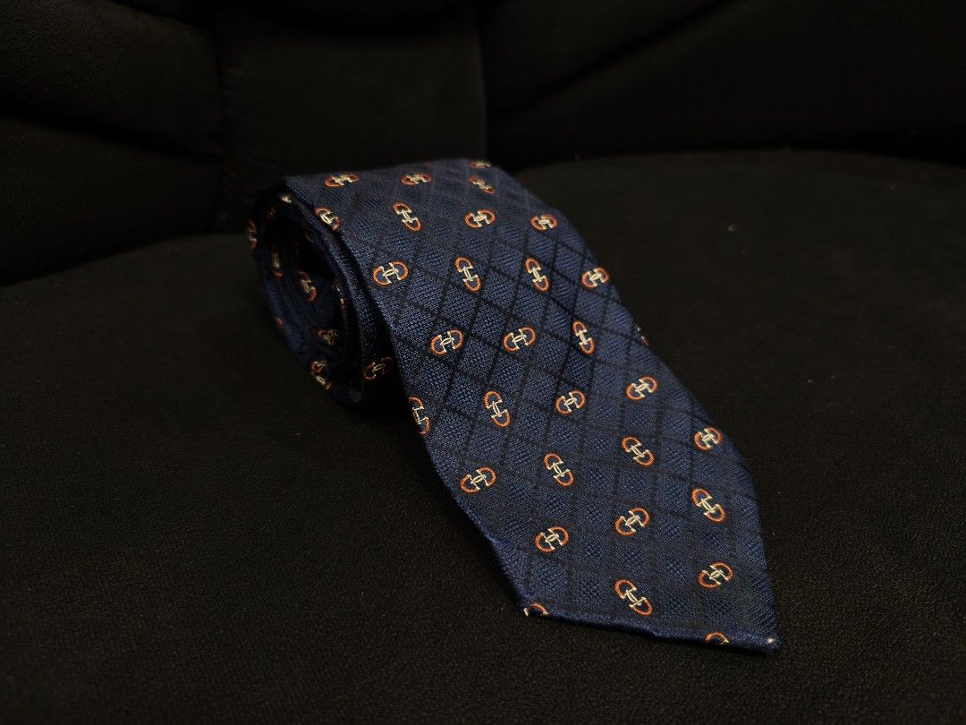 Gucci Horsebit necktie (Category: Luxury Accessories) located in Digos. Submitted by emmanuel28 (Listing ID 1467197576, Image 1). Description: Gucci Horsebit necktie Authentic 100% silk material excellent condition with issue, rans (please see last photos) Location: Davao del sur Buyer shoulders shipping fee.
