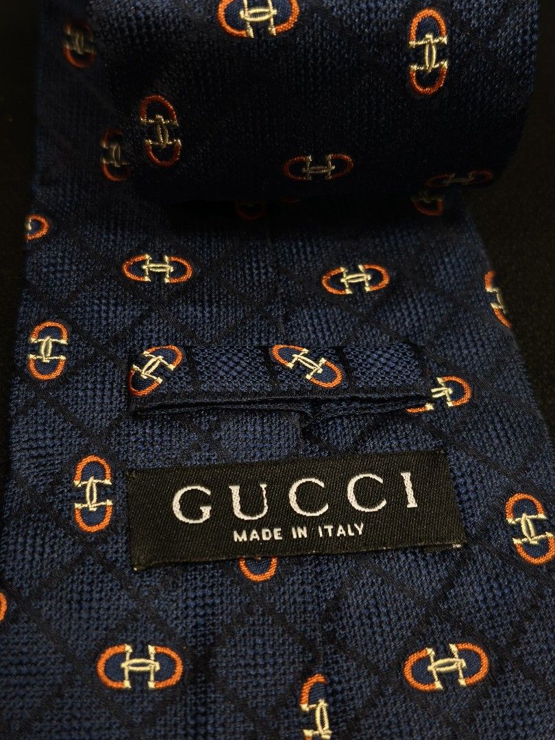 Gucci Horsebit necktie (Category: Luxury Accessories) located in Digos. Submitted by emmanuel28 (Listing ID 1467197576, Image 2). Description: Gucci Horsebit necktie Authentic 100% silk material excellent condition with issue, rans (please see last photos) Location: Davao del sur Buyer shoulders shipping fee.