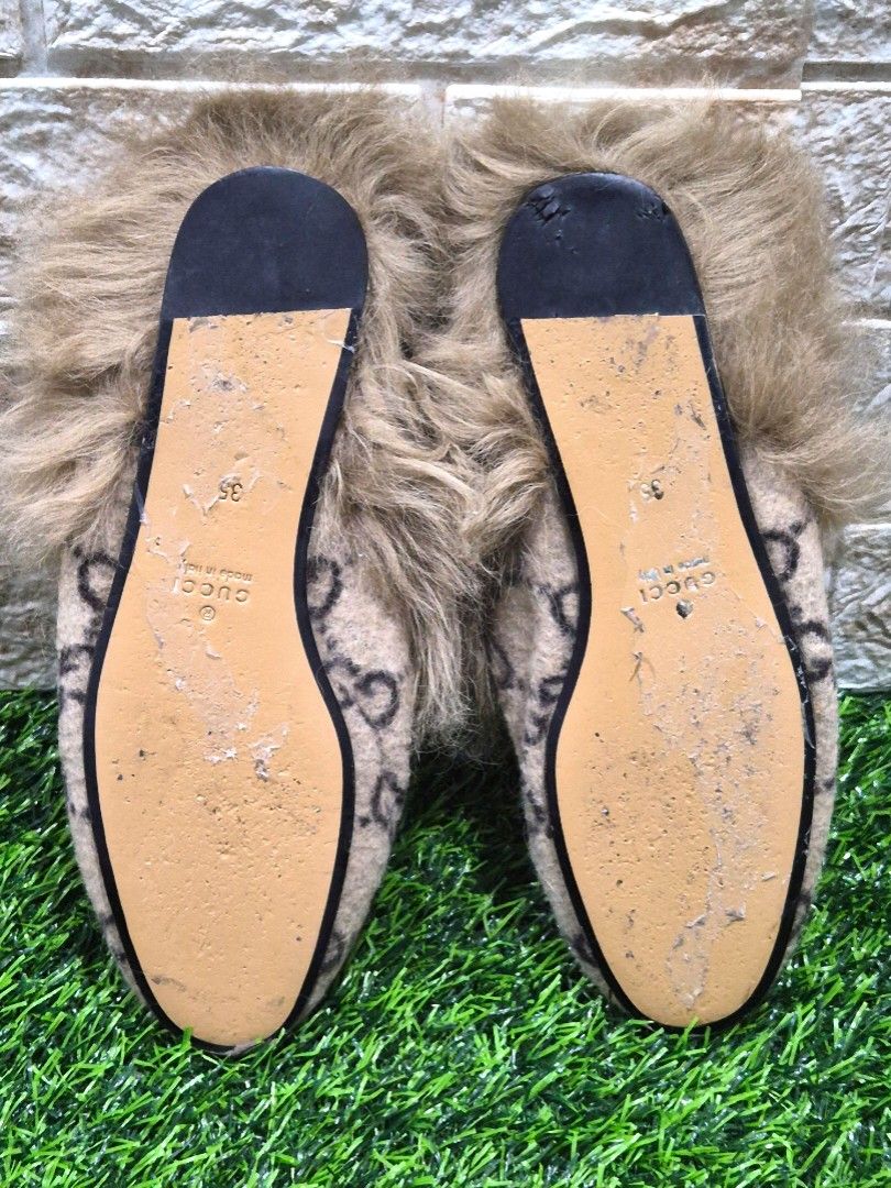 Gucci Mules Size EU 35 (Category: Slippers and slides) located in Antipolo. Submitted by saribymonica (Listing ID 1467237786, Image 2). Description: Condition: Very good pre-owned condition. Worn strictly indoors only. The canvas uppers and shearling lining are very clean and well-maintained. Please note there are minor punctures and surface indentations on the black rubber heel taps on the soles from indoor use/stepping on grit (see photos). Thi