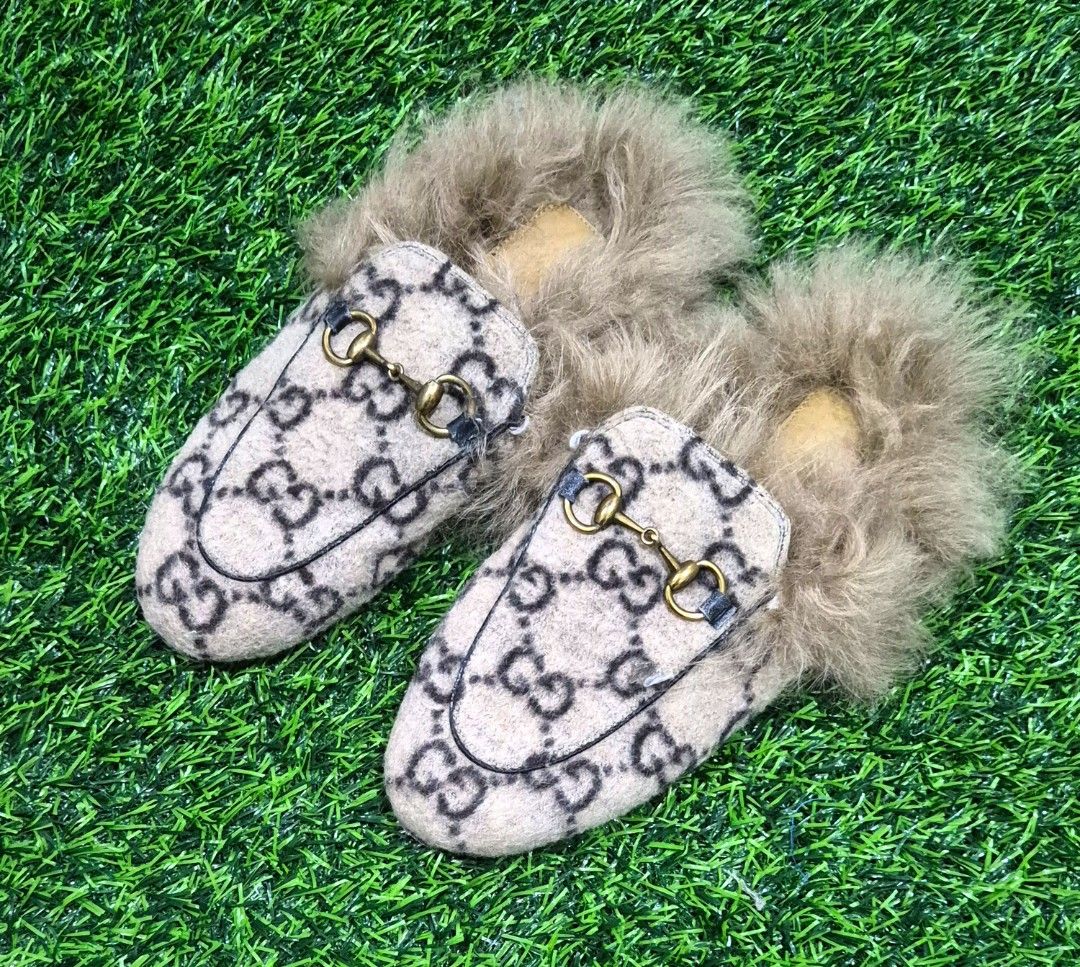 Gucci Mules Size EU 35 (Category: Slippers and slides) located in Antipolo. Submitted by saribymonica (Listing ID 1467237786, Image 1). Description: Condition: Very good pre-owned condition. Worn strictly indoors only. The canvas uppers and shearling lining are very clean and well-maintained. Please note there are minor punctures and surface indentations on the black rubber heel taps on the soles from indoor use/stepping on grit (see photos). Thi