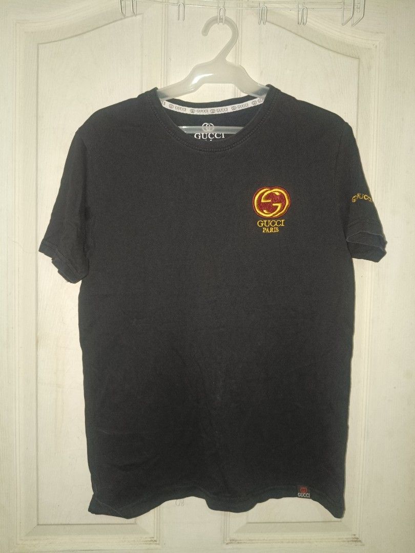 Gucci Paris Black T-Shirt (Category: Tshirts & Polo Shirts ) located in Bacoor. Submitted by knncze (Listing ID 1467208878, Image 2). Description: • preloved, wore it a lot • size tag: M • W×L - 18×25.5 • issue - one hole, worn out label.