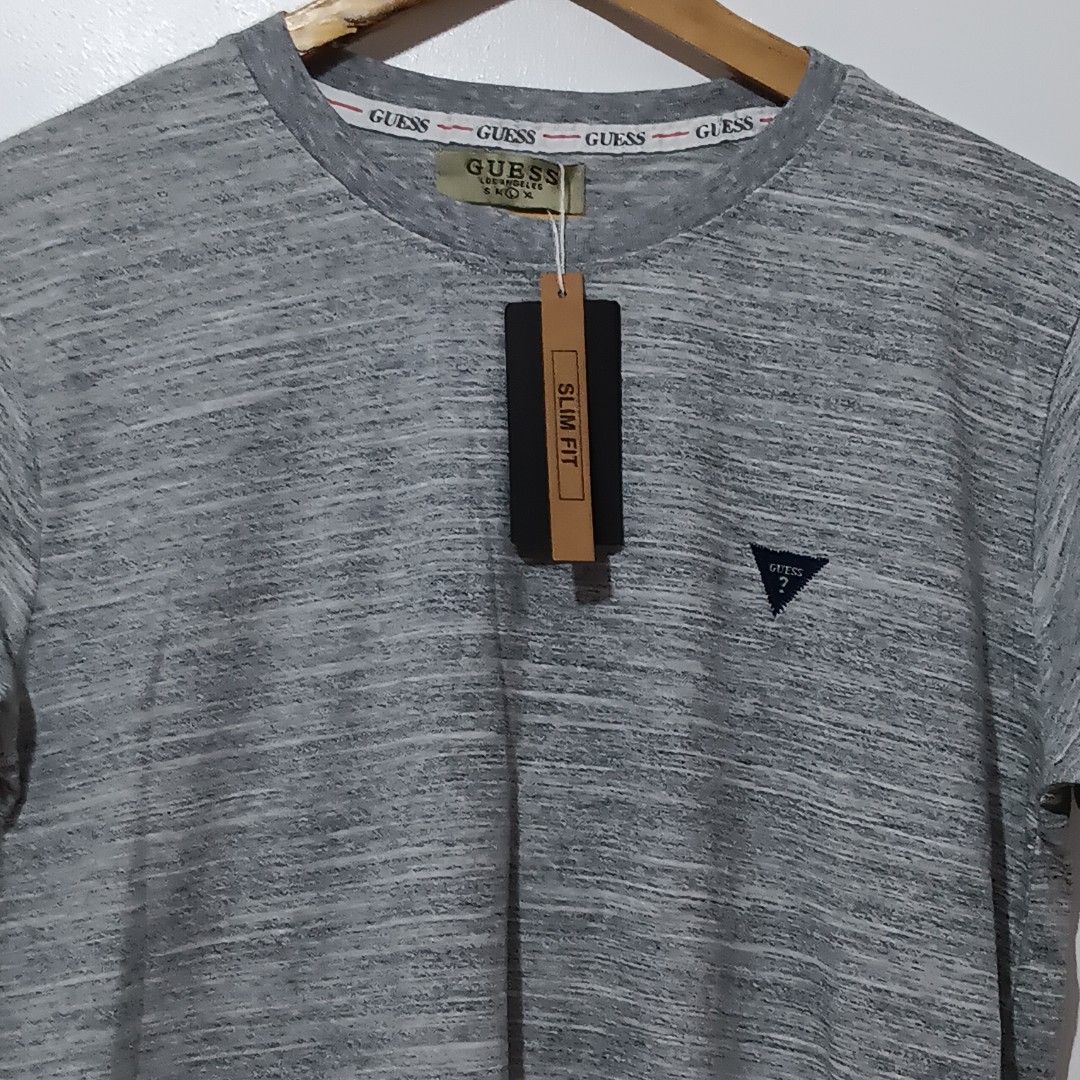 Guess gray shirt (Category: Tshirts & Polo Shirts ) located in Binangonan. Submitted by darlen21 (Listing ID 1467299827, Image 1). Description: .