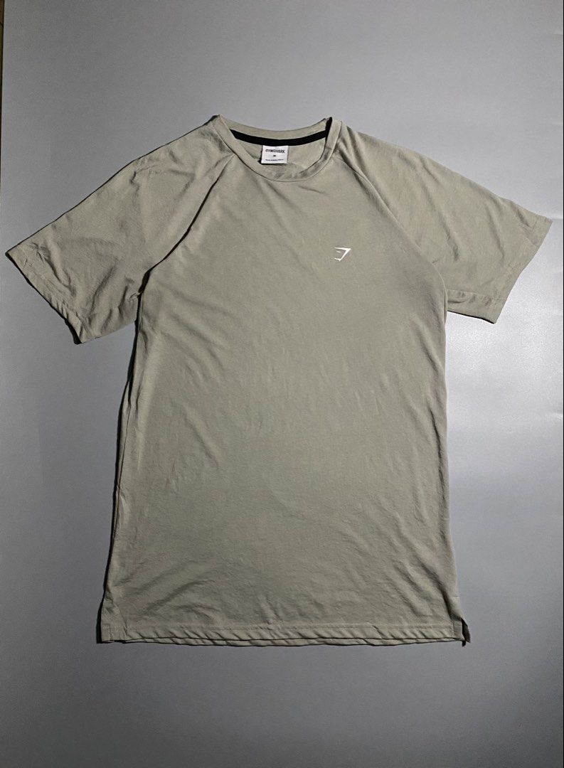 Gymshark Grey T-Shirt Size M (Category: Tshirts & Polo Shirts ) located in Dumaguete. Submitted by reyvincent22414 (Listing ID 1467206326, Image 1). Description: - Brand: Gymshark - Color: Grey - Size: Medium - Material: 85% polyester, 15% cotton - Features: Short sleeves, raglan shoulders, small white chest logo - Ideal for: Gym workouts, training, or casual everyday wear.
