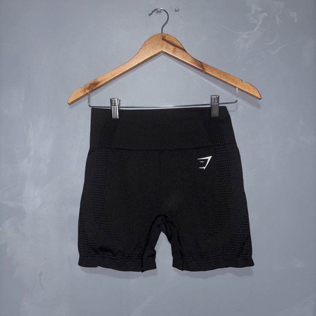 GYMSHARK VITALS SEAMLESS SHORTS (Category: Activewear) located in Lucena. Submitted by newacckeli (Listing ID 1467330520, Image 1). Description: - Brand: Gymshark - Color: Black with white heat-sealed shark logo on left hip - Style: Seamless shorts with a flattering high waistband - Features: Breathable dot knit patterns down both sides for extra ventilation - Material: Super stretchy fabric designed to support movement.