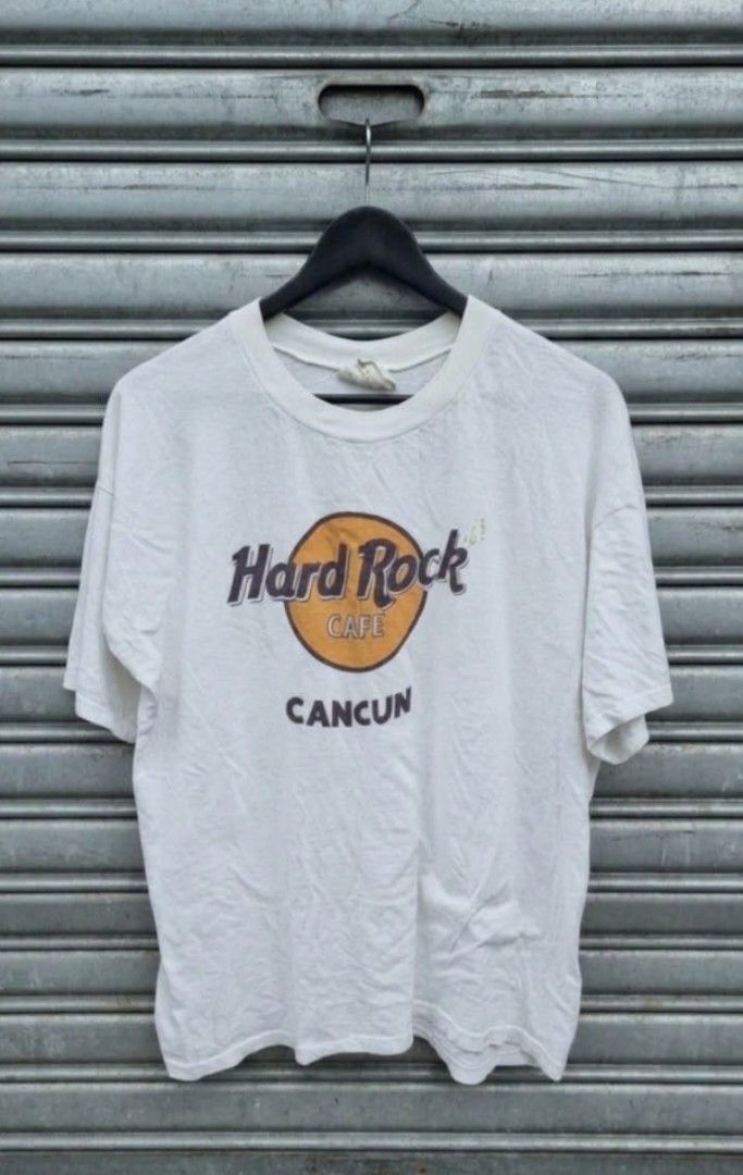 Vintage Hard Rock Cafe Cancun (Category: Tshirts & Polo Shirts ) located in Manila. Submitted by darth3pter (Listing ID 1461740450, Image 1). Description: Actual dimes 22x27 Tag: Mt.Miro Issue: seen on last pic (multiple pen holes) Stitching: SSTAW.