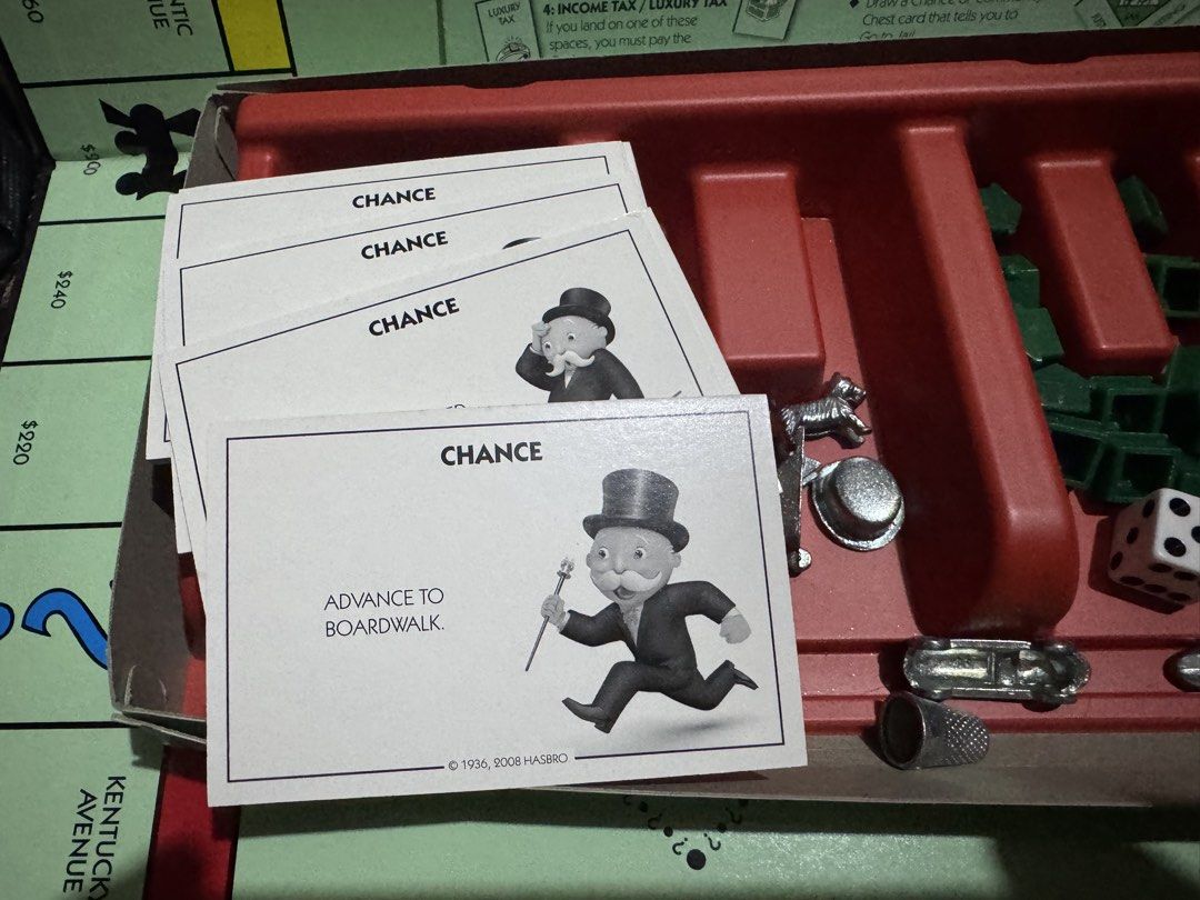 Hasbro Monopoly Board Game Family Edition (Category: Board Games & Puzzles) located in San Pedro. Submitted by pageturner19 (Listing ID 1467176325, Image 3). Description: Note: missing one metal token - Authentic Hasbro Monopoly board game - Includes game board, red banker's tray, paper money, Chance and Community Chest cards - Comes with metal tokens (top hat, car, etc.), green houses, red hotels, and dice with speed die - Condition: Box shows m