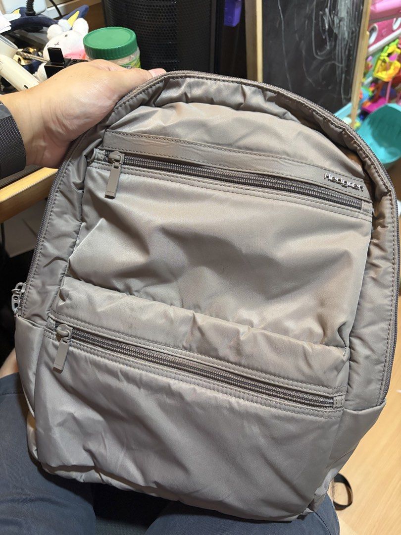 Hedgren Ava Neo Backpack - Taupe (Category: Backpacks) located in Manila. Submitted by smmcruz (Listing ID 1458848979, Image 2). Description: - Hedgren backpack in a stylish taupe color - Originally bought for ~8k - Multiple zippered pockets on the front for quick access to your essentials. - Lightweight and practical design, ideal for daily use. - Perfect for school, work, or everyday errands. - Smooth and fully functional zippers. - Adjustable 