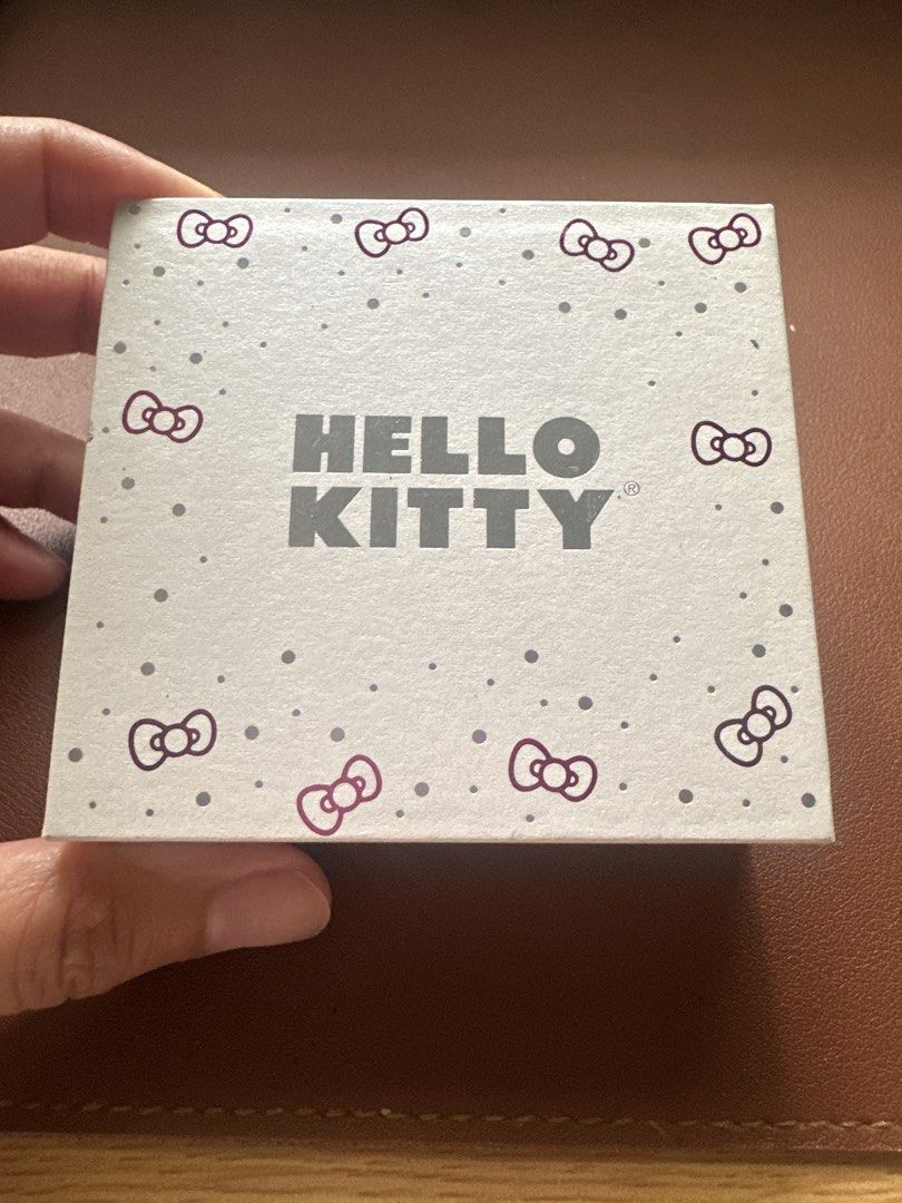 Hello Kitty Gold Flash Plated Pendant Necklace with Box (Category: Necklaces) located in Makati City. Submitted by jamfab11 (Listing ID 1467360705, Image 1). Description: - can be given as gift - Brand: Sanrio / Kitty - Material: Gold flash plated finish - Design: White enamel face with red crystal bow detail - Packaging: Includes original silver exterior branded presentation box with bow pattern - Special Feature: Includes insert card with text 