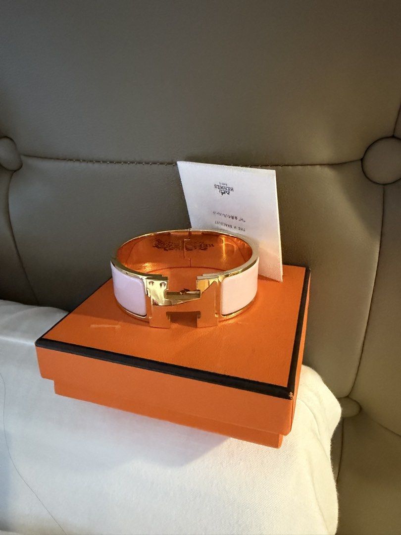 Hermes Clic Clac- pink/gold (Category: Other Accessories) located in Makati City. Submitted by lambogirl (Listing ID 1467274146, Image 3). Description: ✔️fits small to medium ✔️comes with entrupy, pouch, box, card and paper bag ✔️Free shipping or Pick up (Makati).