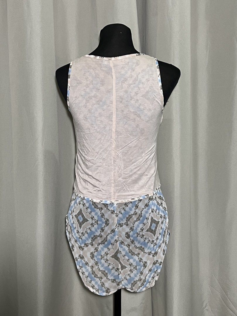 High low tank top (Category: Sleeveless) located in Las Pinas. Submitted by jilanah (Listing ID 1467354466, Image 2). Description: .