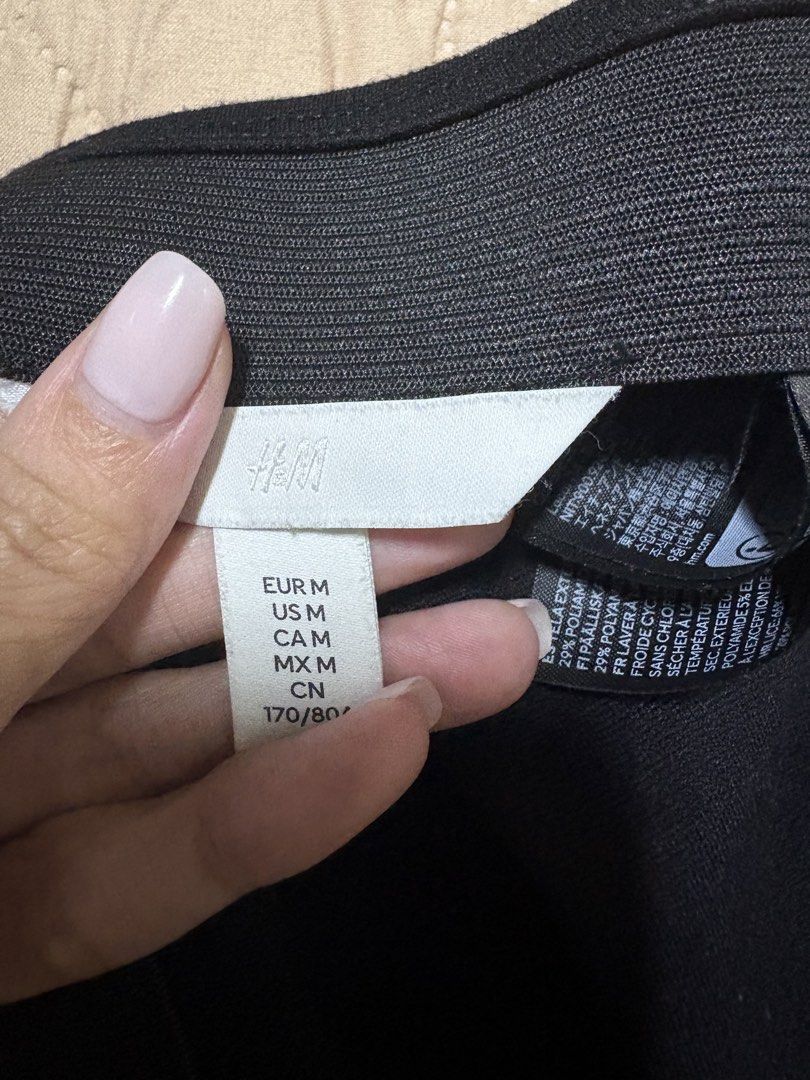 H&M Black Skirt Size (Category: Skirts) located in Quezon City. Submitted by jinnysells (Listing ID 1467350110, Image 2). Description: Size: M (Fits EUR, US, CA, MX M) A-line skirt H&M size Medium Garterized.
