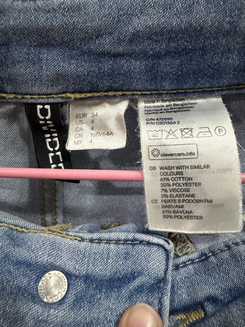 H&M Divided Denim Shorts (Category: Shorts) located in Calamba. Submitted by handpickedbynetty (Listing ID 1467224775, Image 2). Description: - Brand: H&M Divided - Style: Light blue wash denim shorts with folded cuffs - Size: EUR 34 / US 4 - Material: Cotton blend with comfortable stretch - Closure: Button closure and zip fly - Condition: Preloved, well-kept closet clearout piece.