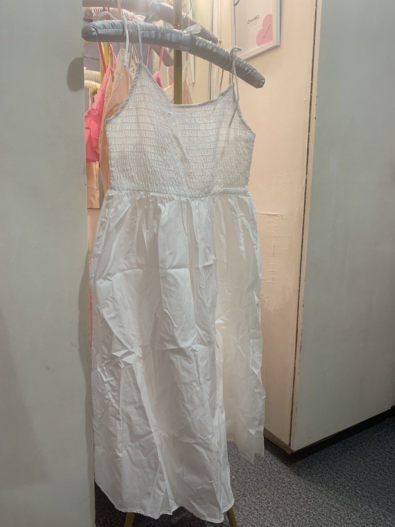 H&M white smocked maxi dress (Category: Dresses) located in Bocaue. Submitted by gaille29 (Listing ID 1467237803, Image 1). Description: .