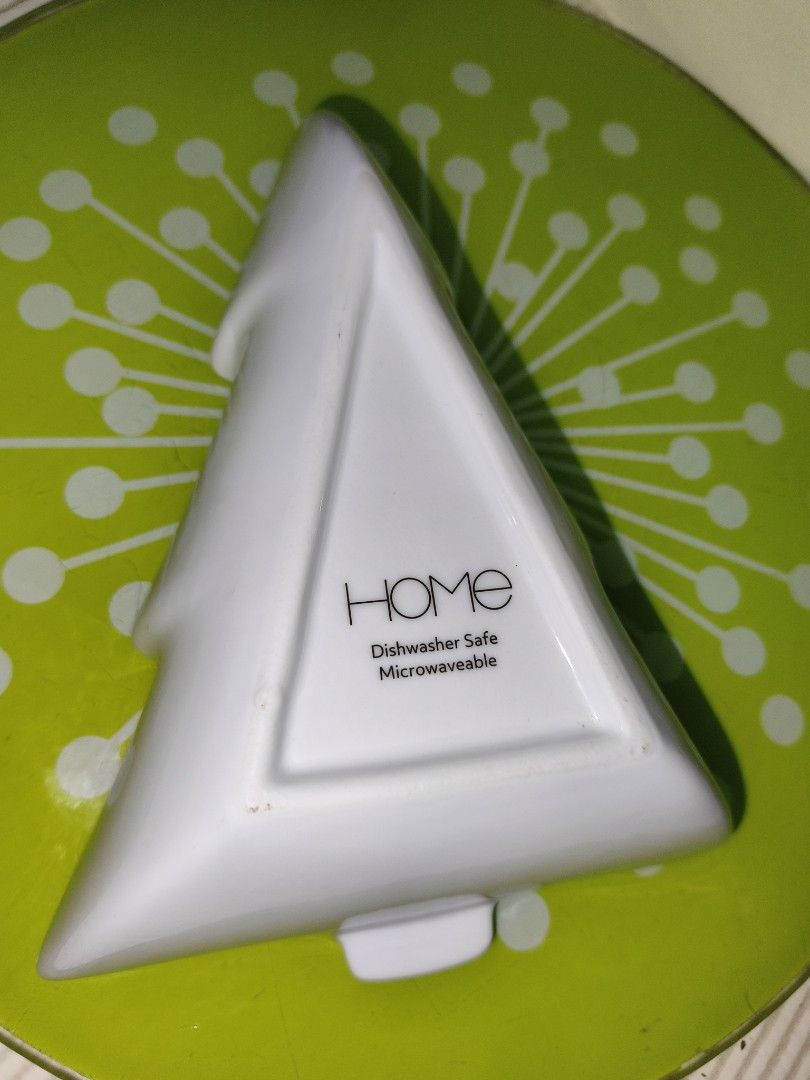 HOME White Christmas Tree Ceramic Dish Bowl (Category: Dinnerware & Cutlery) located in Manila. Submitted by reascheyss51406 (Listing ID 1467171307, Image 3). Description: - Festive Christmas tree-shaped ceramic dish - Brand: HOME (back stamp) - Microwave and dishwasher safe - Smooth glaze with no chips or cracks - Ideal for holiday snacks, dips, or small trinkets.