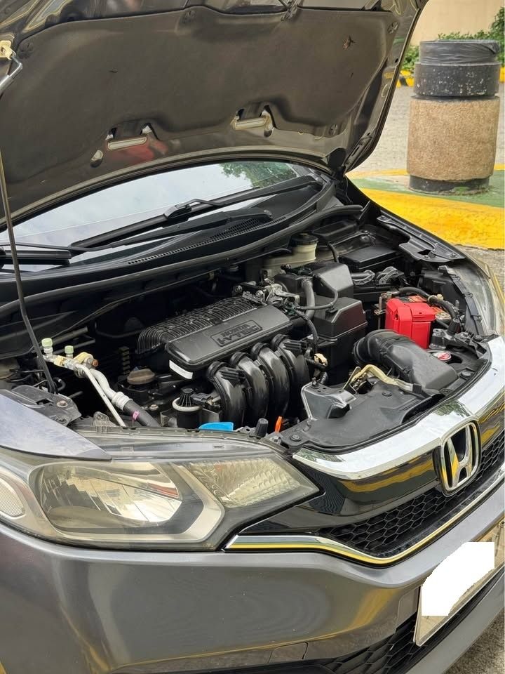 Honda Jazz 1.5 RS Hatchback (A) (Category: Used Cars) located in Malvar. Submitted by jvevangelio (Listing ID 1467317384, Image 3). Description: Honda Jazz GK5 VX Plus Navi RS 2015 (Semi-Loaded) Automatic transmission 1.5 Strong Engine Paddle Shifter Color: Modern Steel 53K ODO Sports Mode Keyless Entry Push Start HKS Muffler Thick Tires Rain Visors Complete All Original Documents Ready for transfer 2 Remote Keys Well maintained Registered to 202