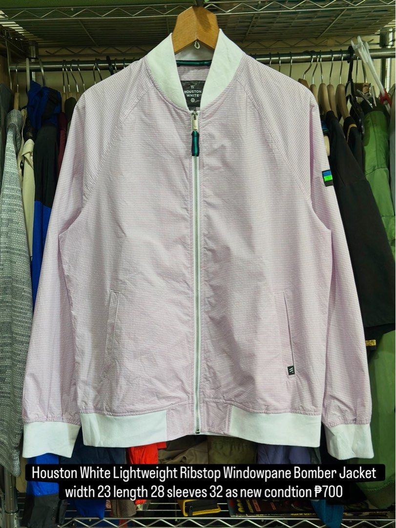 Houston White Lightweight Ribstop Windowpane Bomber Jacket (Category: Coats, Jackets and Outerwear) located in Daet. Submitted by thrifthings2018 (Listing ID 1467252828, Image 1). Description: - Brand: Houston White - Style: Lightweight ripstop windowpane bomber jacket - Color/Pattern: Pink with white grid pattern, white collar, cuffs, and hem - Features: Full zip closure with custom zipper pull, two front welt pockets - Material: Cotton, nylon, 