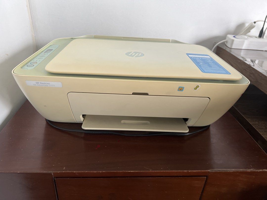 HP DeskJet Ink Advantage 2777 All-in-One Printer (Category: Printers, Scanners & Copiers) located in Manila. Submitted by jb005 (Listing ID 1467230762, Image 1). Description: - Model: HP DeskJet Ink Advantage 2777 - Features: Wireless setup, flatbed scanner, and top-loading input tray - Design: Aesthetic cream and light green body with an easy-to-use top control panel - Condition: Powers on and fully ready for daily printing tasks - Ideal for: Ho