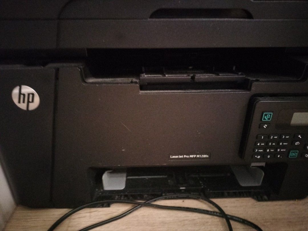 HP LaserJet Pro MFP M128fn Printer (Category: Printers, Scanners & Copiers) located in Manila. Submitted by coco_lifeph (Listing ID 1467237207, Image 1). Description: - Model: HP LaserJet Pro MFP M128fn multifunction laser printer - Color: Sleek black finish with built-in scanner lid and numeric keypad - Performance: Works great for home office documents and heavy printing jobs - Design: Space-saving footprint that fits easily on your desk - Incl