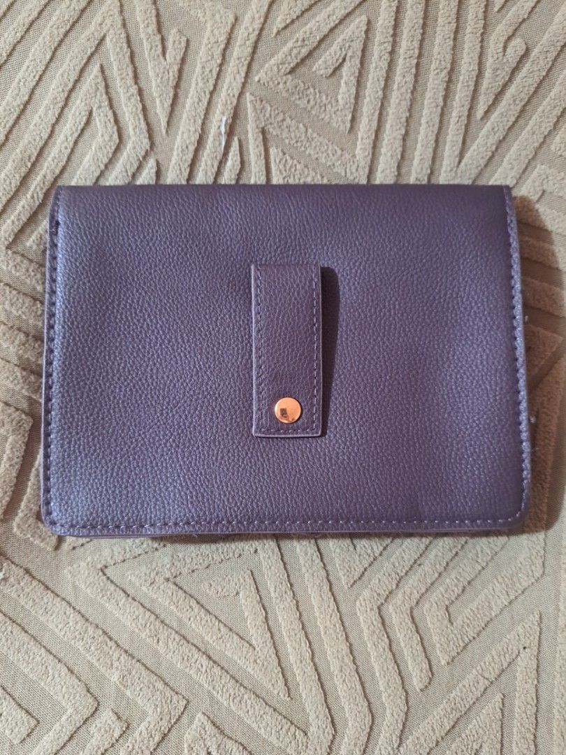 HUGO BOSS Parfums POUCH/BELT POUCH (Category: Luxury Bags & Wallets) located in Pasig City. Submitted by aecollection03 (Listing ID 1467172382, Image 3). Description: -Dimensions- -7"W-5"H-1¼"B inches - Brand: BOSS Parfums - Item: Dark purple faux leather agenda / organizer - Hardware: Rose gold metal clasp with embossed logo (protective plastic film still attached) - Interior: Purple fabric lining - Exterior: Back strap detail with a snap button