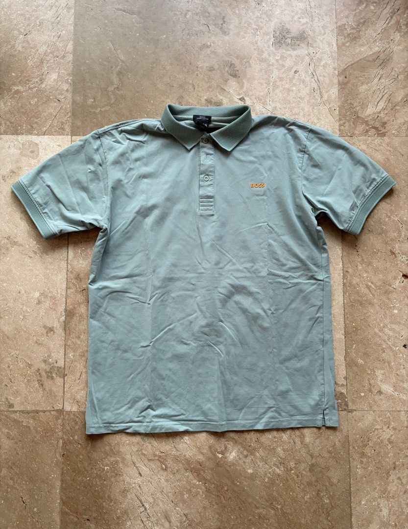 Hugo Boss Polo, Sage Green (Category: Tshirts & Polo Shirts ) located in Quezon City. Submitted by tidyup.lara (Listing ID 1467294753, Image 1). Description: Size XL Shoulder 18.5” Bust 42” Waist 42” Length 30” Condition 8/10: used but in good condition.