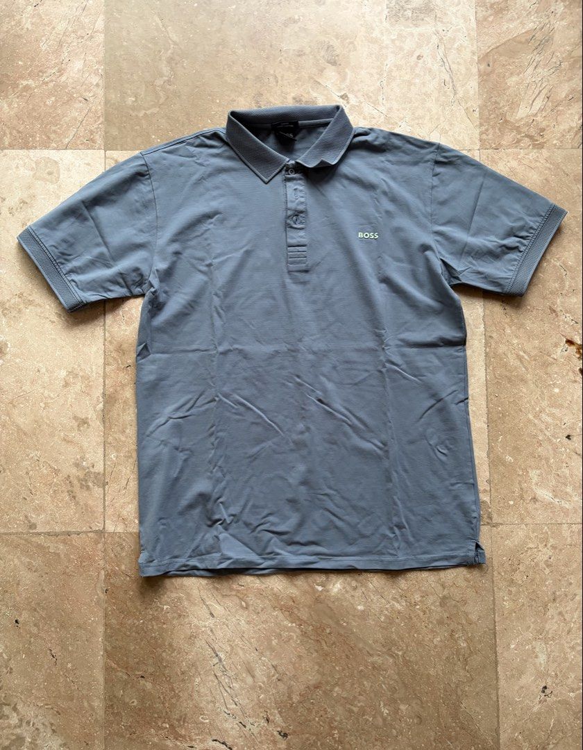 Hugo Boss Polo, Slate Blue (Category: Tshirts & Polo Shirts ) located in Quezon City. Submitted by tidyup.lara (Listing ID 1467295199, Image 1). Description: Best fits L-XL frames Shoulder 19” Bust 44” Waist 42” Length 30” Condition 8/10: used but in good condition.