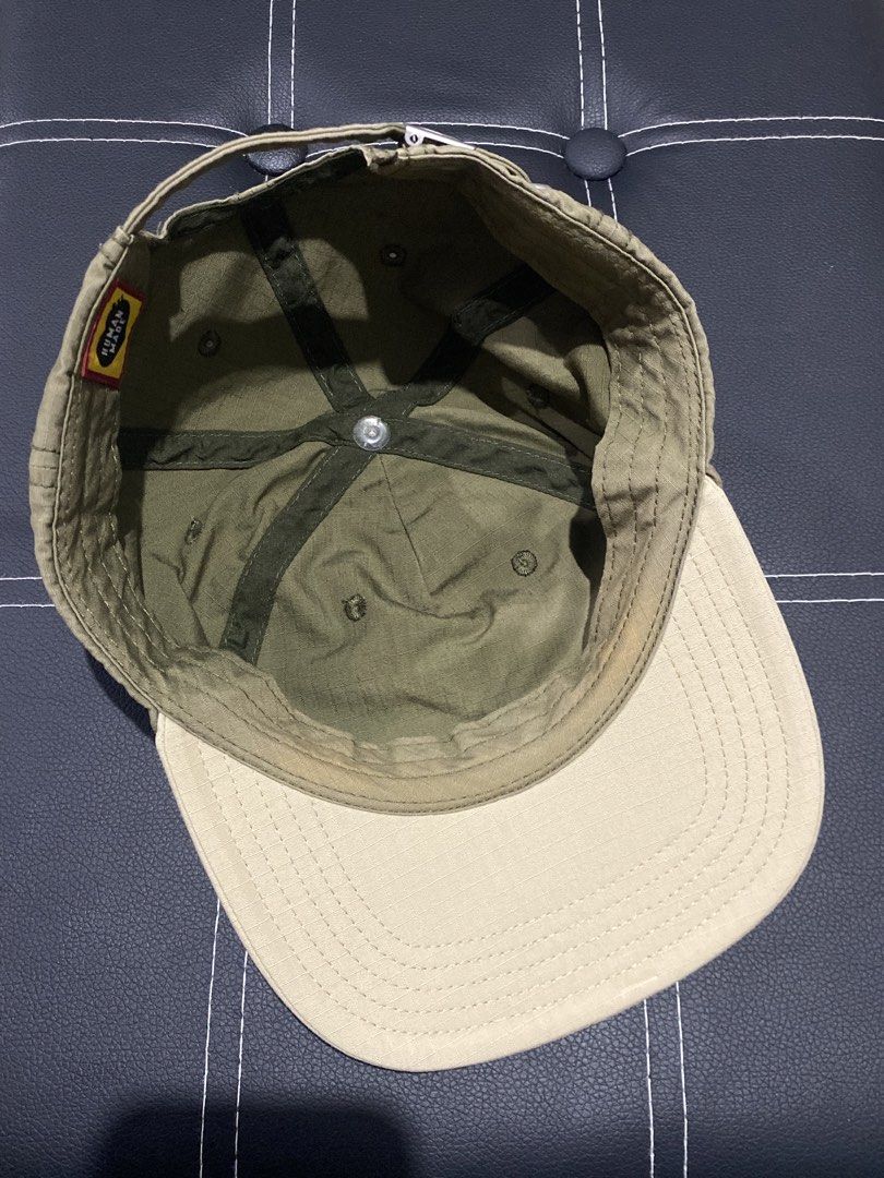 Human Made - 5 Panel Ripstop Olive Green Cap (Category: Caps & Hats) located in Naga. Submitted by junked_garments (Listing ID 1467239338, Image 3). Description: Human Made - 5 Panel Ripstop Olive Green Cap 9.2/10 Condition Unnoticeable Stain Check Last Pic Authentic OSFA Dm me to purchase! .