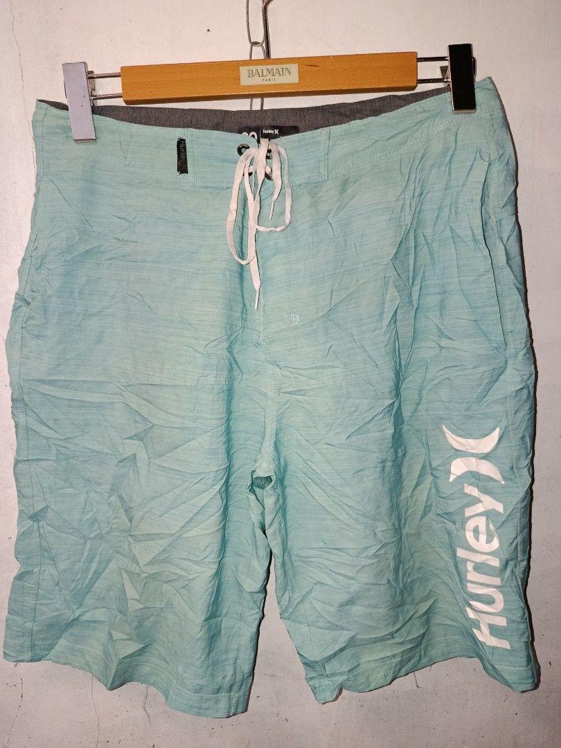 Hurley Board Shorts Light Blue Size 30 (Category: Swim Trunks & Board Shorts) located in Nabunturan. Submitted by marmitoren42236 (Listing ID 1467257597, Image 1). Description: - Brand: Hurley (Buckle Exclusive) - Color: Light Blue - Size: 30 Waist - Closure: White front drawstring - Design: Large vertical Hurley logo on left leg - Features: Convenient side pocket with branded tag - Origin: Made in China - Condition: Excellent/Ready to wear.