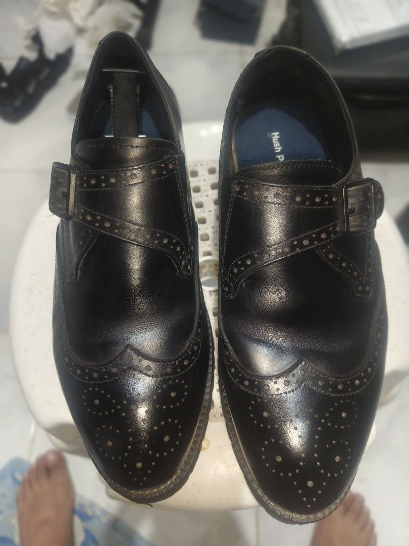 Hush Puppies Black Monk Strap Brogues (Category: Dress Shoes) located in Sariaya. Submitted by queen_1213 (Listing ID 1467257959, Image 1). Description: - Brand: Hush Puppies - Color/Material: Black leather - Style: Monk strap shoes with wingtip brogue detailing and single buckle closure - Comfort: DeepComfort blue insoles - Condition: Minor creasing from previous wear - Soles: Sturdy with good grip remaining.