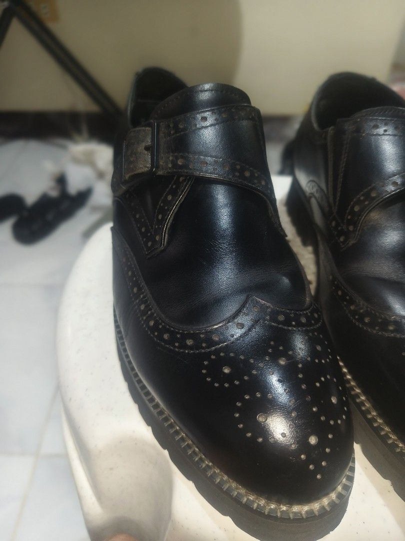 Hush Puppies Black Monk Strap Brogues (Category: Dress Shoes) located in Sariaya. Submitted by queen_1213 (Listing ID 1467257959, Image 3). Description: - Brand: Hush Puppies - Color/Material: Black leather - Style: Monk strap shoes with wingtip brogue detailing and single buckle closure - Comfort: DeepComfort blue insoles - Condition: Minor creasing from previous wear - Soles: Sturdy with good grip remaining.