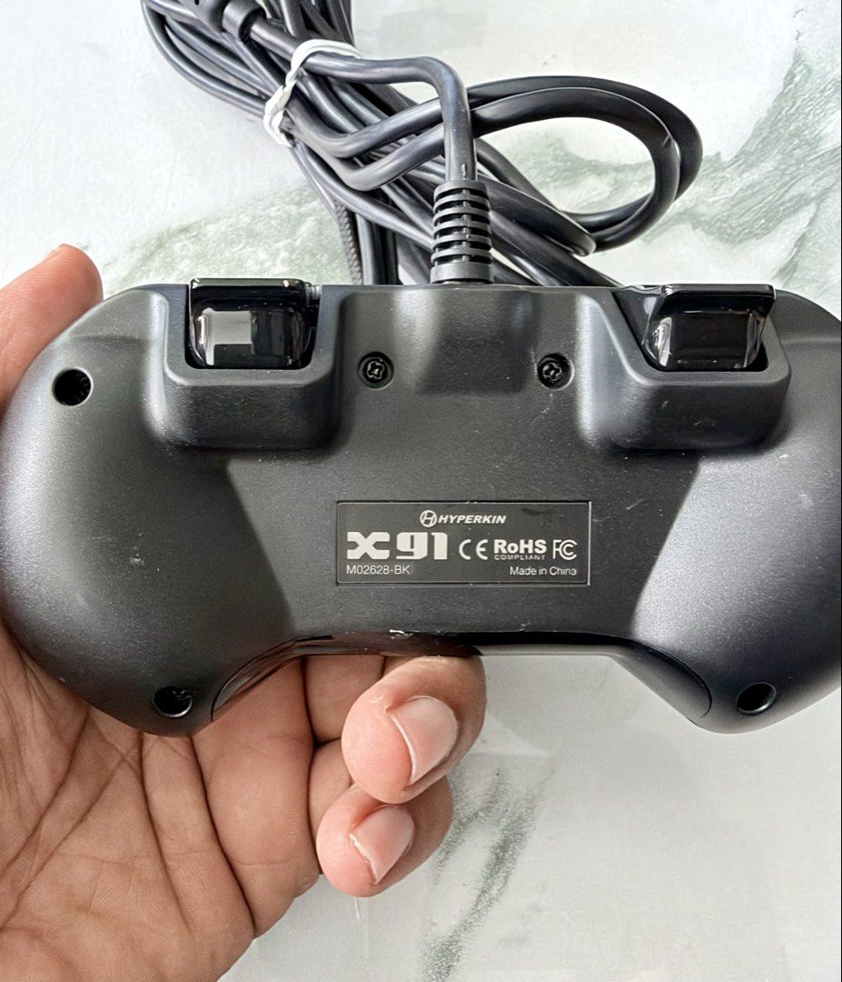 Hyperkin X91 Wired Controller (Category: Controllers) located in Kuala Lumpur. Submitted by julian_balogh (Listing ID 1467320030, Image 3). Description: Hyperkin X91 Wired Controller Tested and functioning perfectly No issues detected All buttons operate well Sell as is .