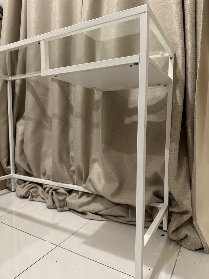 IKEA VITTSJÖ Laptop table (Category: Tables & Sets) located in Mandaluyong City. Submitted by ourcscloset (Listing ID 1463963895, Image 3). Description: white/glass, 100x36 cm (39 3/8x14 1/8 “) Glass is intact and table is well kept. No known issues. Would choose to keep it if we have the extra space since its minimalist and functional. No haggling, this is the last price. .