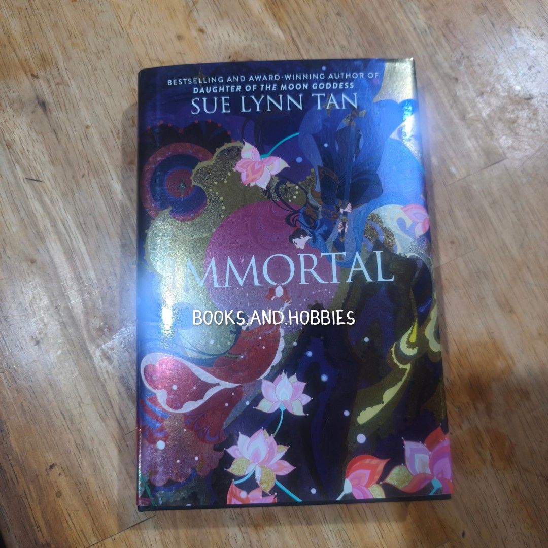 Immortal by Sue Lynn Tan (Category: Storybooks) located in Quezon City. Submitted by books.and.hobbiesph (Listing ID 1467218905, Image 1). Description: Brand new remaindered copy Hardcover edition Sprayed pink page edges, custom illustrated endpapers, and vibrant foil-stamped cover.