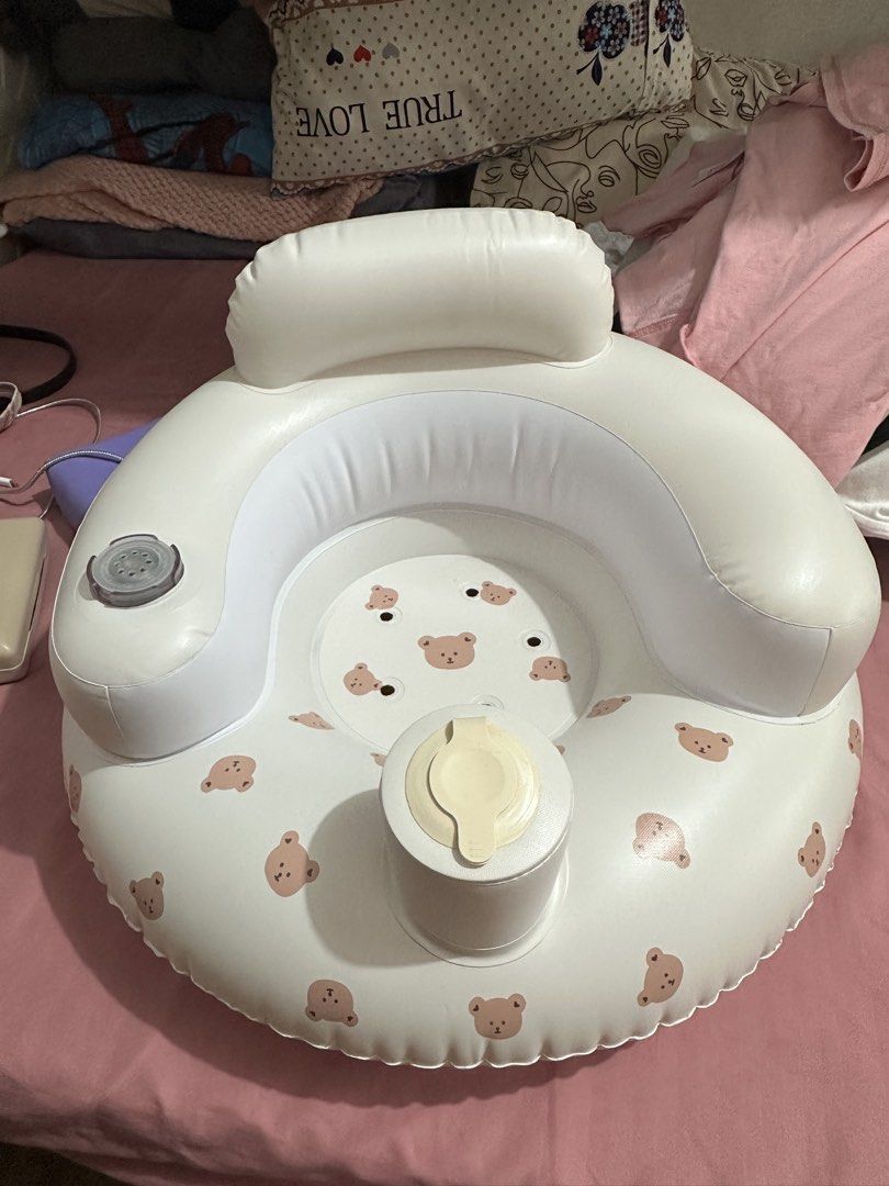 Inflatable baby bath seat with cute bear pattern (Category: Bathtub & Bath Accessories) located in Pasig City. Submitted by jcrr5 (Listing ID 1467318607, Image 1). Description: - Adorable white inflatable baby chair featuring a cute brown bear print - Built-in air pump column right in the front for quick and easy inflation - High backrest provides solid head and neck support for your little one - Convenient drain holes on the seat base make it id