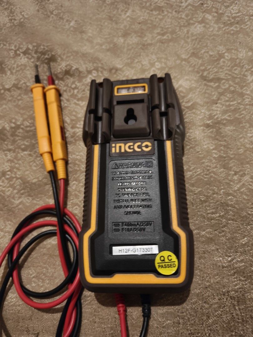 Ingco DM36002 Digital Multimeter with Test Leads (Category: Construction Tools & Equipment) located in Manila. Submitted by bravefox_31b6f5 (Listing ID 1467284571, Image 2). Description: - Model: Ingco DM36002 True RMS Digital Multimeter - Condition: Clean, well-maintained unit with QC passed sticker - Safety Rating: 10A CAT III for reliable use - Display & Controls: Clear LCD screen and easy-to-use rotary dial - Inclusions: Red and black test le