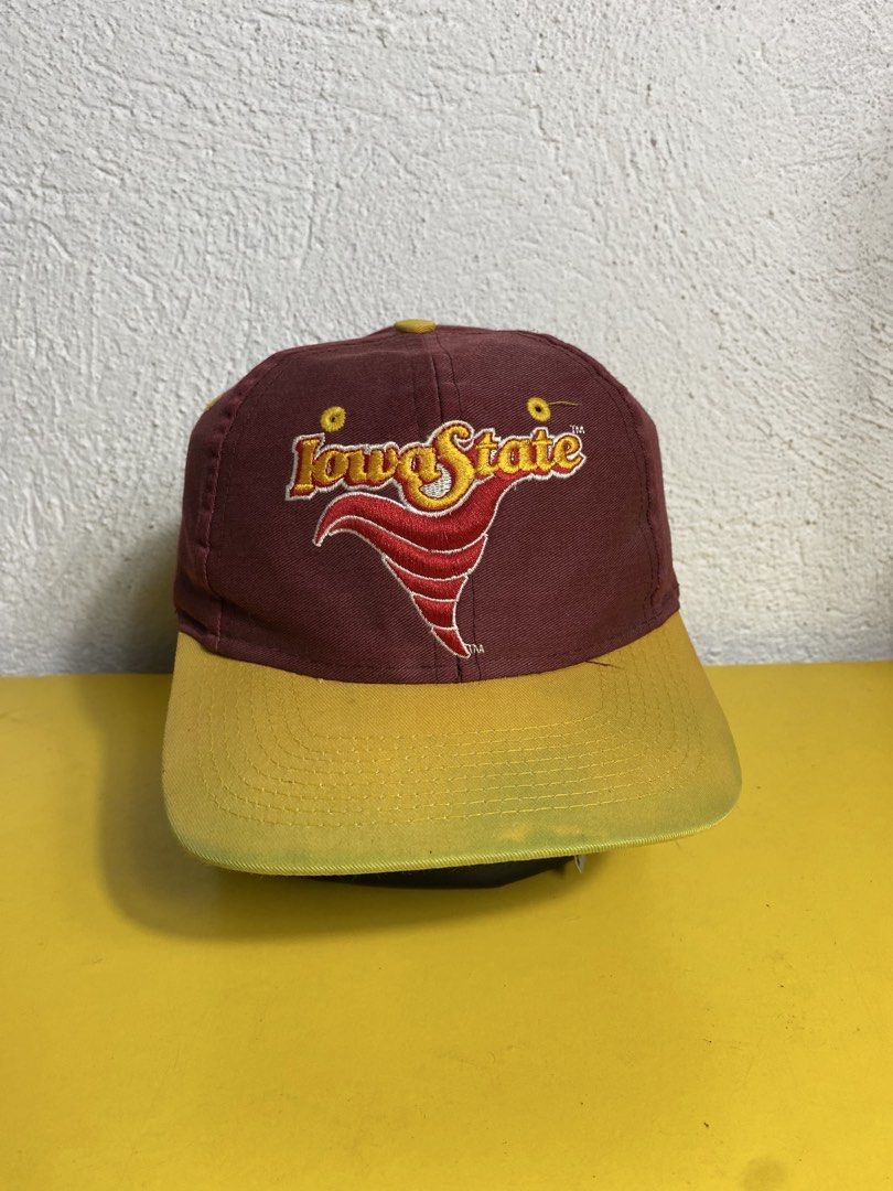 Iowa State Cyclones Vintage Snapback Cap (Category: Caps & Hats) located in Cabanatuan. Submitted by adrialesdrip (Listing ID 1467315763, Image 1). Description: - Team: Iowa State Cyclones - Color: Maroon and yellow - Design: Big embroidered tornado logo on front, 'CYCLONES' spelled out on the back - Closure: Yellow snap closure - Condition: Interior tag shows some fraying and wear, overall solid piece for fans.
