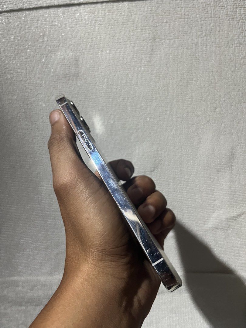 iPhone 12 Pro Max 128gb (Category: iPhone 12 Series) located in Caloocan City. Submitted by djaye.gadgets (Listing ID 1467254520, Image 3). Description: Honest issue ⚠️ - LCD Line - Camera zoom 2.5x sometimes shaky/vibrate but tolerable. Can provide sample video pgusapan nalang natin. For sale Only Factory Unlock (No Sim Restrictions) No icloud not Bypass unli reset LL/A Variant iOS 26.6.1 Face ID working True Tone working Battery Health 96% Phys