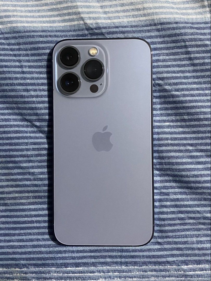 Iphone 13 Pro (Category: iPhone 13 Series) located in Pasig City. Submitted by mjlaa (Listing ID 1467286815, Image 1). Description: 💰 Price: ₱19,000 (slightly negotiable for sure buyers) 📦 Storage: 256GB 🔋 Battery Health: 74% 👩🏻 Lady-owned ✨ Condition: 9/10, smooth and well-maintained. Minimal hairline scratches, no dents. 🛠️ Repair History: No history of repair. Never been opened, original factory seal intact. 📸 Features: Face ID working,