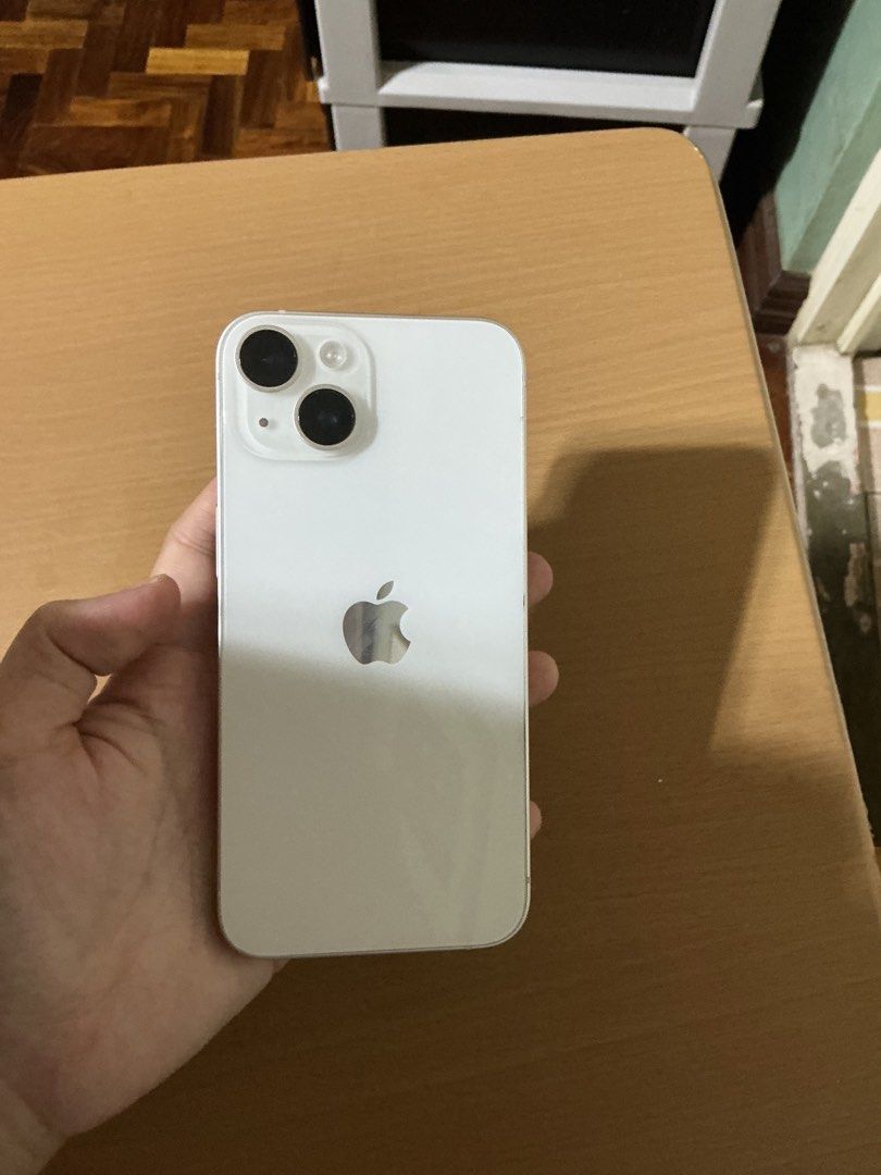 Iphone 14 128 GB (Category: iPhone 14 Series) located in Manila. Submitted by mochakaty1 (Listing ID 1467254980, Image 2). Description: 📌 FOR SALE: iPhone 14 128GB (Starlight/White) 💰 Price: ₱20,000 ✨ CONDITION & DETAILS: Appearance: 99% smooth, pristine condition. No dents or deep scratches. Lady-owned Internal: 100% original parts, never opened, and never serviced/repaired. Battery Health: 76% (Still performs perfectly, factored into the low 