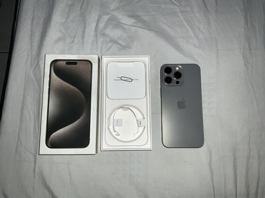 Iphone 15 Pro Max 256 GB (Category: iPhone 15 Series) located in Quezon City. Submitted by dcops (Listing ID 1467196293, Image 2). Description: Iphone 15 Pro Max 256 GB - Natural titanium - RFS: Planning to upgrade - 89% Battery Health - With box and original papers (type c cable not included) - No sim restriction - Phone is in pristine condition (no dents, scratches) - Meetups for sure buyer.