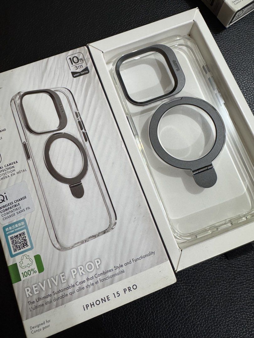Iphone 15Pro Case (Category: Cases & Sleeves) located in Cauayan City . Submitted by espiritucj (Listing ID 1467343360, Image 1). Description: - Compatible Model: iPhone 15 Pro (Revive Prop Series) - Design: Transparent case with dark gray camera protection and built-in metal ring stand - Protection: 10ft / 3m drop tested - Features: Wireless charging (Qi) compatible, 100% sustainable materials - Condition: Brand new in original box.
