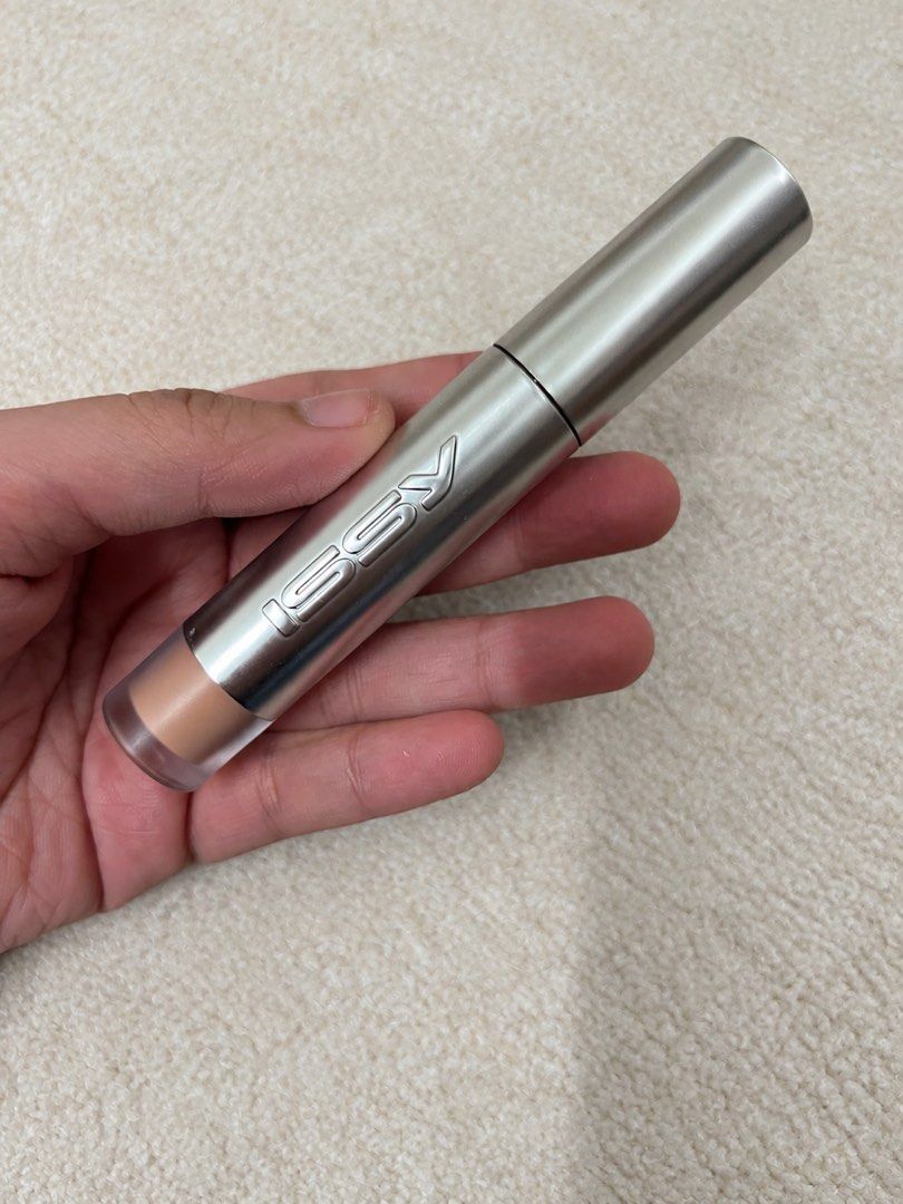 Issy Corrector (Pink Peach) (Category: Makeup) located in Cagayan de Oro. Submitted by simplydecluttering_makeup (Listing ID 1467348946, Image 1). Description: Brand new and swatches once only. Rfs: Shade doesn’t suit me. - Brand: Issy - Product: Corrector - Shade: Pink Peach - Size: 4 ml / 0.135 fl. oz. - Condition: Brand new - Features: Metallic silver finish with embossed branding and shade sticker at the bottom - Best for: Color correcting an