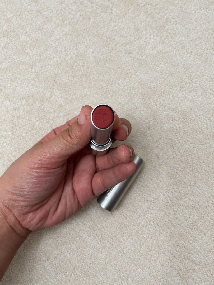 ISSY True Matte Lip Bullet (Shade: Opus) (Category: Makeup) located in Cagayan de Oro. Submitted by simplydecluttering_makeup (Listing ID 1467349159, Image 2). Description: Bought recently. Selling because I don’t use it. Used once only. Embossing is still visible. - Brand: Issy - Product: True Matte Lip Bullet - Shade: Opus - Finish: Rich, high-payoff matte - Packaging: Sleek silver metallic tube.