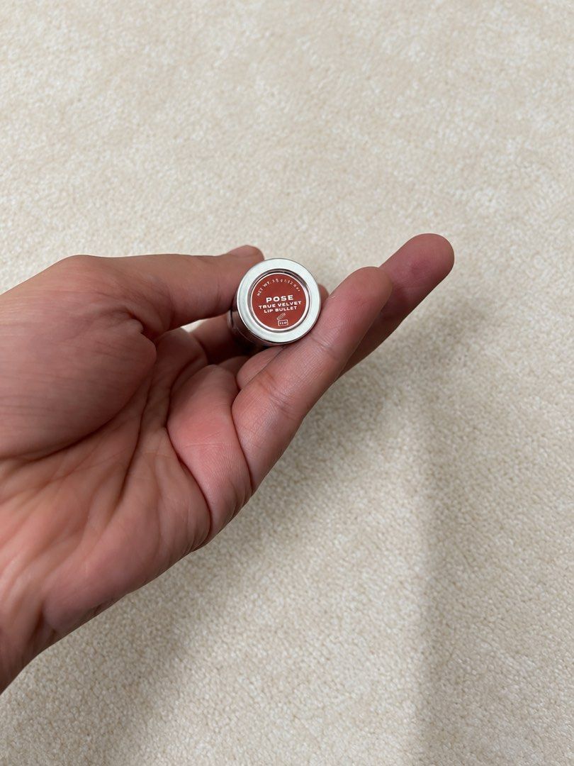 ISSY True Velvet Lip Bullet (Shade: Pose) (Category: Makeup) located in Cagayan de Oro. Submitted by simplydecluttering_makeup (Listing ID 1467349042, Image 2). Description: Used once only. Bought recently. Selling because I don’t use it. - Brand: Issy - Item: True Velvet Lip Bullet - Shade: Pose (Warm brown nude) - Finish: Smooth velvet matte - Packaging: Silver metallic casing with embossed branding.