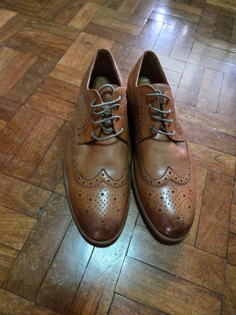 Italian Brogue Wingtip Leather shoes - Dune (Category: Dress Shoes) located in Manila. Submitted by cl1988 (Listing ID 1467200457, Image 1). Description: - Brand: Dune (Italian Brogues style) - Color: Classic Tan Brown - Size: 43 eu / 10 us - Material: Premium leather upper with detailed wingtip perforations - Used 5x only - very slight leather stain on toe part. other than that, shoes are in good condition. 09178024466 Makati *shipping and booki