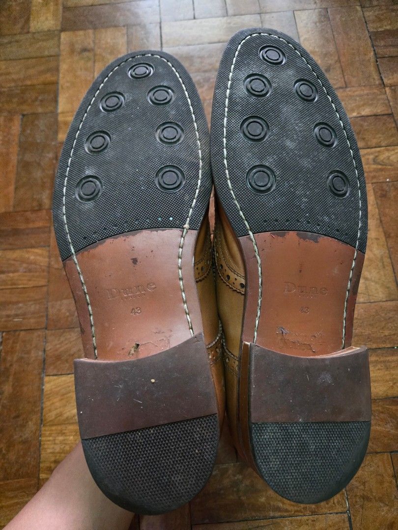 Italian Brogue Wingtip Leather shoes - Dune (Category: Dress Shoes) located in Manila. Submitted by cl1988 (Listing ID 1467200457, Image 3). Description: - Brand: Dune (Italian Brogues style) - Color: Classic Tan Brown - Size: 43 eu / 10 us - Material: Premium leather upper with detailed wingtip perforations - Used 5x only - very slight leather stain on toe part. other than that, shoes are in good condition. 09178024466 Makati *shipping and booki