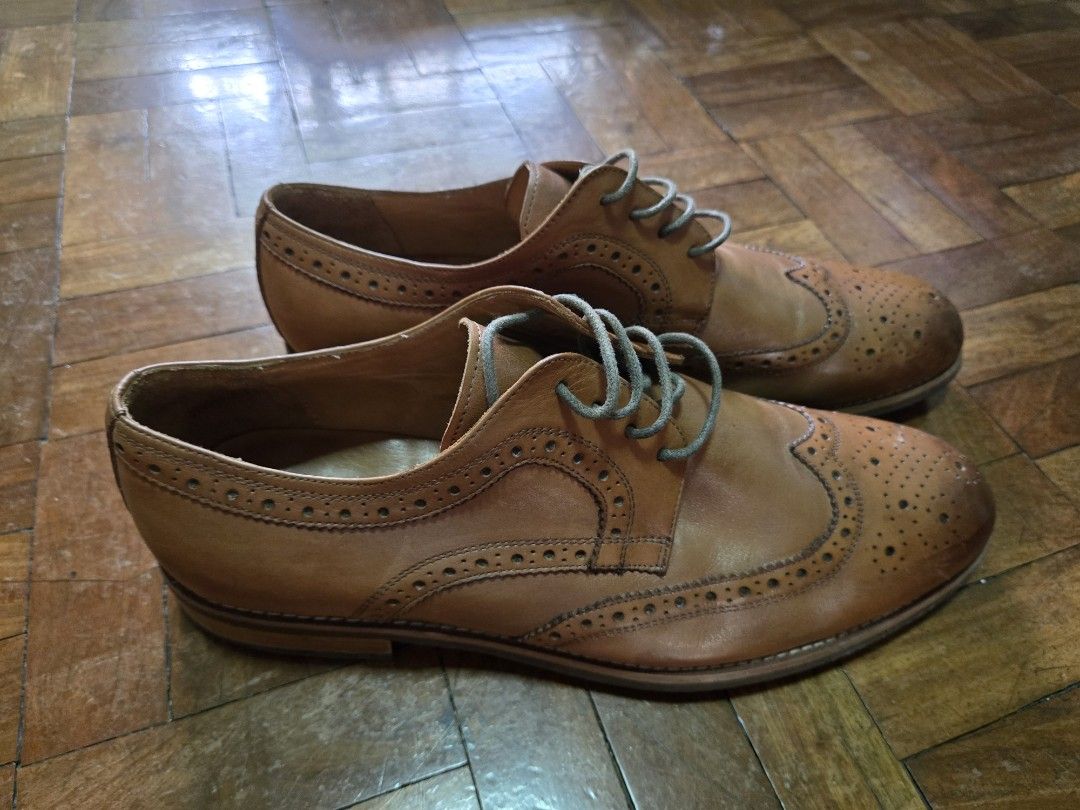 Italian Brogue Wingtip Leather shoes - Dune (Category: Dress Shoes) located in Manila. Submitted by cl1988 (Listing ID 1467200457, Image 2). Description: - Brand: Dune (Italian Brogues style) - Color: Classic Tan Brown - Size: 43 eu / 10 us - Material: Premium leather upper with detailed wingtip perforations - Used 5x only - very slight leather stain on toe part. other than that, shoes are in good condition. 09178024466 Makati *shipping and booki