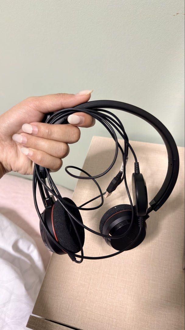 Jabra On-Ear Wired Headset with Boom Microphone (Category: Headphones & Headsets) located in Cebu City. Submitted by eynjlin (Listing ID 1467237235, Image 1). Description: - Brand: Jabra - Color: Black - Condition: Clean and fully working - Features: Adjustable boom mic, comfortable on-ear foam cushions, durable plastic headband - Connectivity: Attached USB or audio cable - Best for: Work calls, online meetings, and gaming.