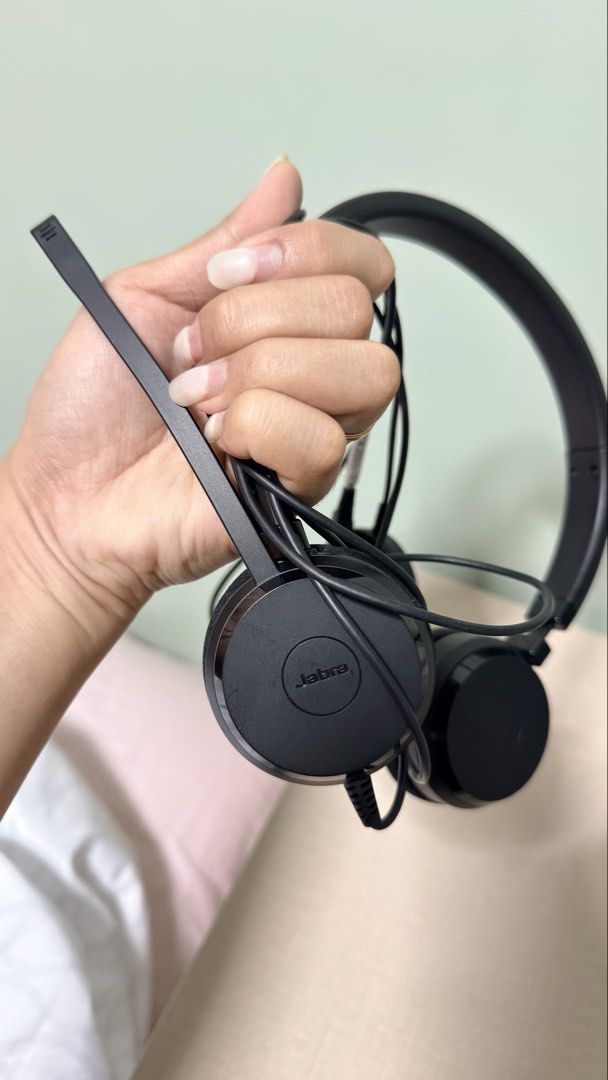 Jabra On-Ear Wired Headset with Boom Microphone (Category: Headphones & Headsets) located in Cebu City. Submitted by eynjlin (Listing ID 1467237235, Image 3). Description: - Brand: Jabra - Color: Black - Condition: Clean and fully working - Features: Adjustable boom mic, comfortable on-ear foam cushions, durable plastic headband - Connectivity: Attached USB or audio cable - Best for: Work calls, online meetings, and gaming.